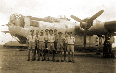 Ernest and his crewmates in front of Liberator bomber 1945